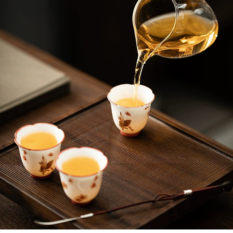 Service à thé en céramique de chèvre - Jade blanc gras avec motifs de fleurs épanouies aux quatre saisons (y compris les ustensiles à boire)