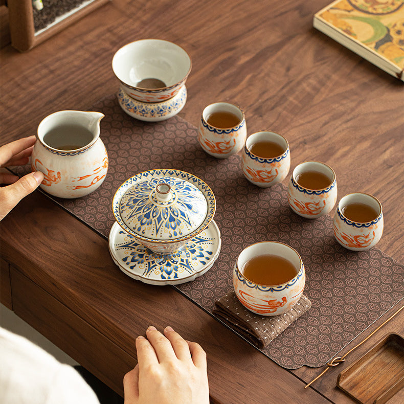 Chinese Ru Kiln ceramic tea and beverage set with painted Dunhuang Flying Apsaras patterns.