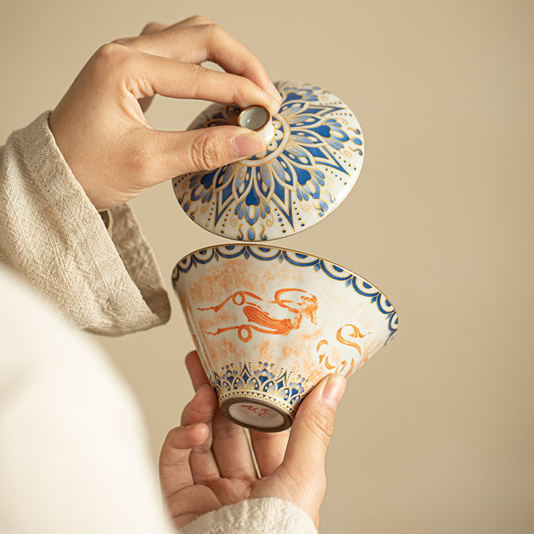 Chinese Ru Kiln ceramic tea and beverage set with painted Dunhuang Flying Apsaras patterns.