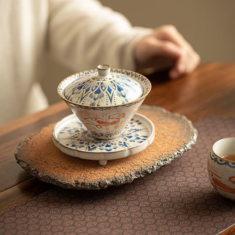 Chinese Ru Kiln ceramic tea and beverage set with painted Dunhuang Flying Apsaras patterns.