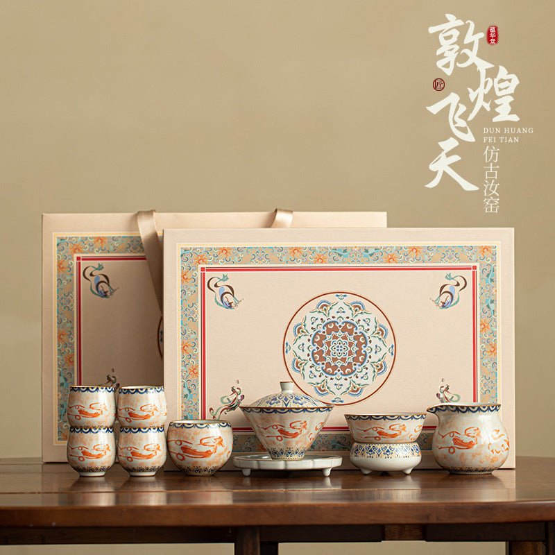 Chinese Ru Kiln ceramic tea and beverage set with painted Dunhuang Flying Apsaras patterns.