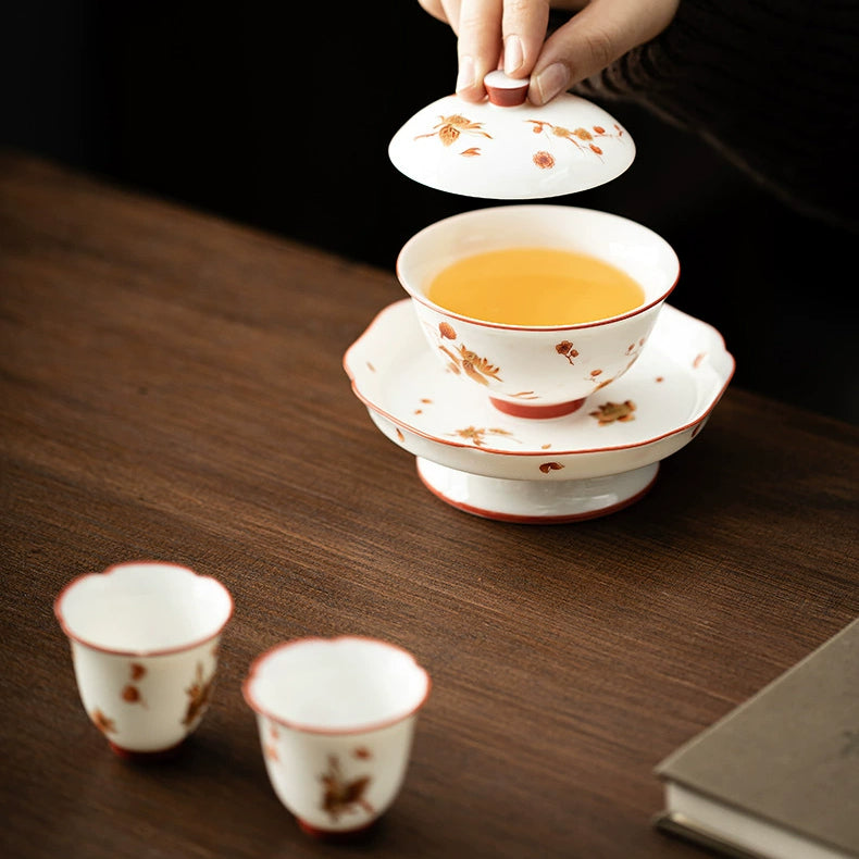 Ceramic Tea Set in Goat - fat Jade White with Patterns of Flowers Blooming in Four Seasons (including drinking utensils)