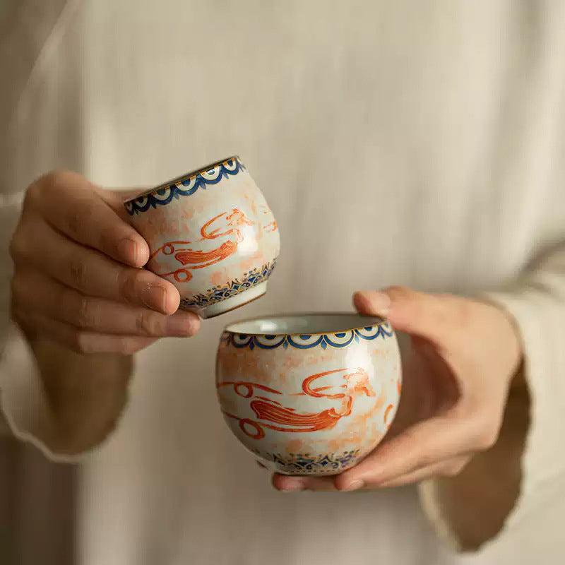 Chinese Ru Kiln ceramic tea and beverage set with painted Dunhuang Flying Apsaras patterns.