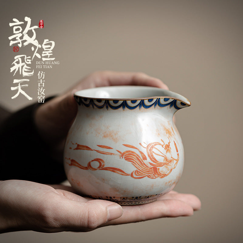 Chinese Ru Kiln ceramic tea and beverage set with painted Dunhuang Flying Apsaras patterns.