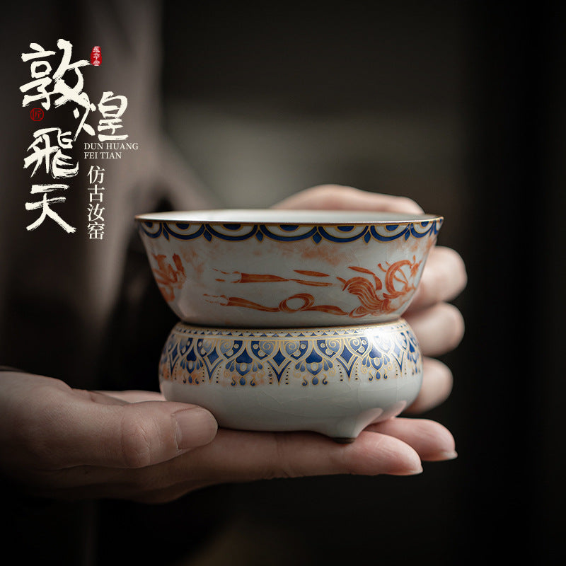 Chinese Ru Kiln ceramic tea and beverage set with painted Dunhuang Flying Apsaras patterns.