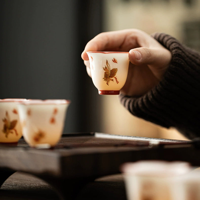 Ceramic Tea Set in Goat - fat Jade White with Patterns of Flowers Blooming in Four Seasons (including drinking utensils)