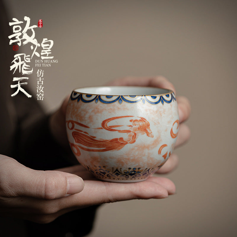 Chinese Ru Kiln ceramic tea and beverage set with painted Dunhuang Flying Apsaras patterns.