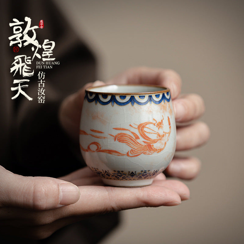 Chinese Ru Kiln ceramic tea and beverage set with painted Dunhuang Flying Apsaras patterns.